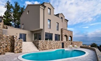 exteriors-view-of-a-modern-villa-in-the-foreground-the-swimming-pool.jpg